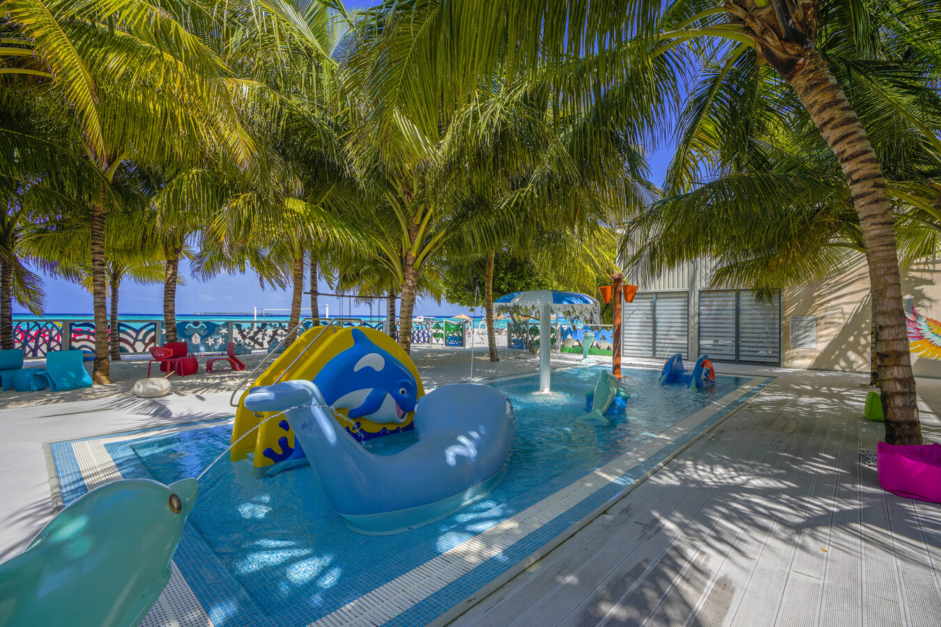 4. Kuredhivaru Resort and Spa- Little Birds Club - Outdoor playground and pool